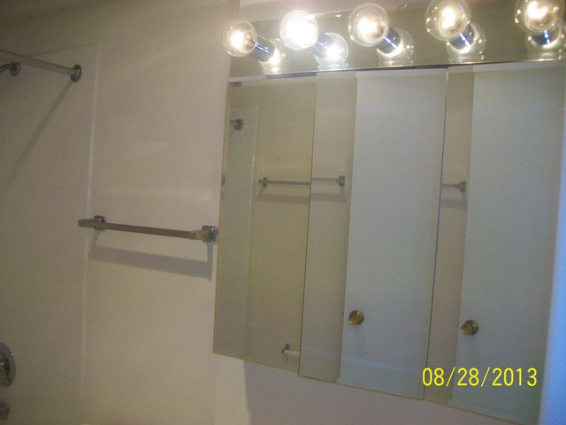 904 Ridge Square, Unit 110 Elk Grove Village, IL 60007 - Photo 10 of 10 a view of a decorative light in a hallway