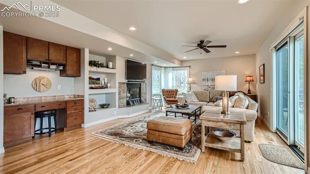 4710 Sandstone Road Monument, CO 80132 - Photo 11 of 28 Family room adjoins the breakfast nook and walk out to the rear deck
