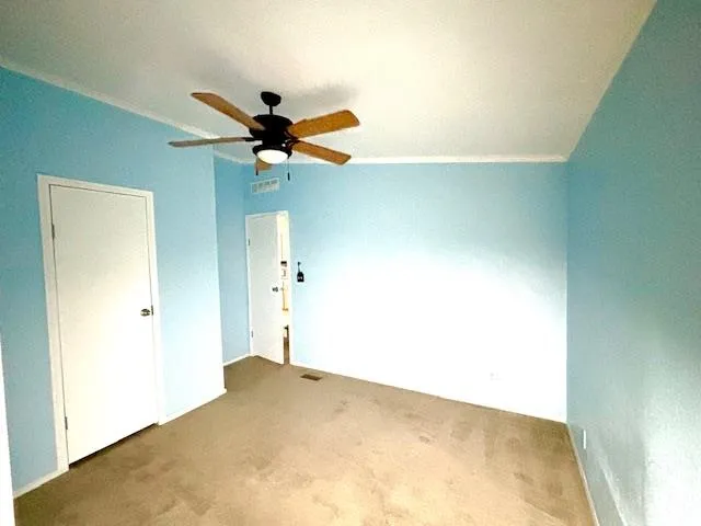 a view of a big room with carpet