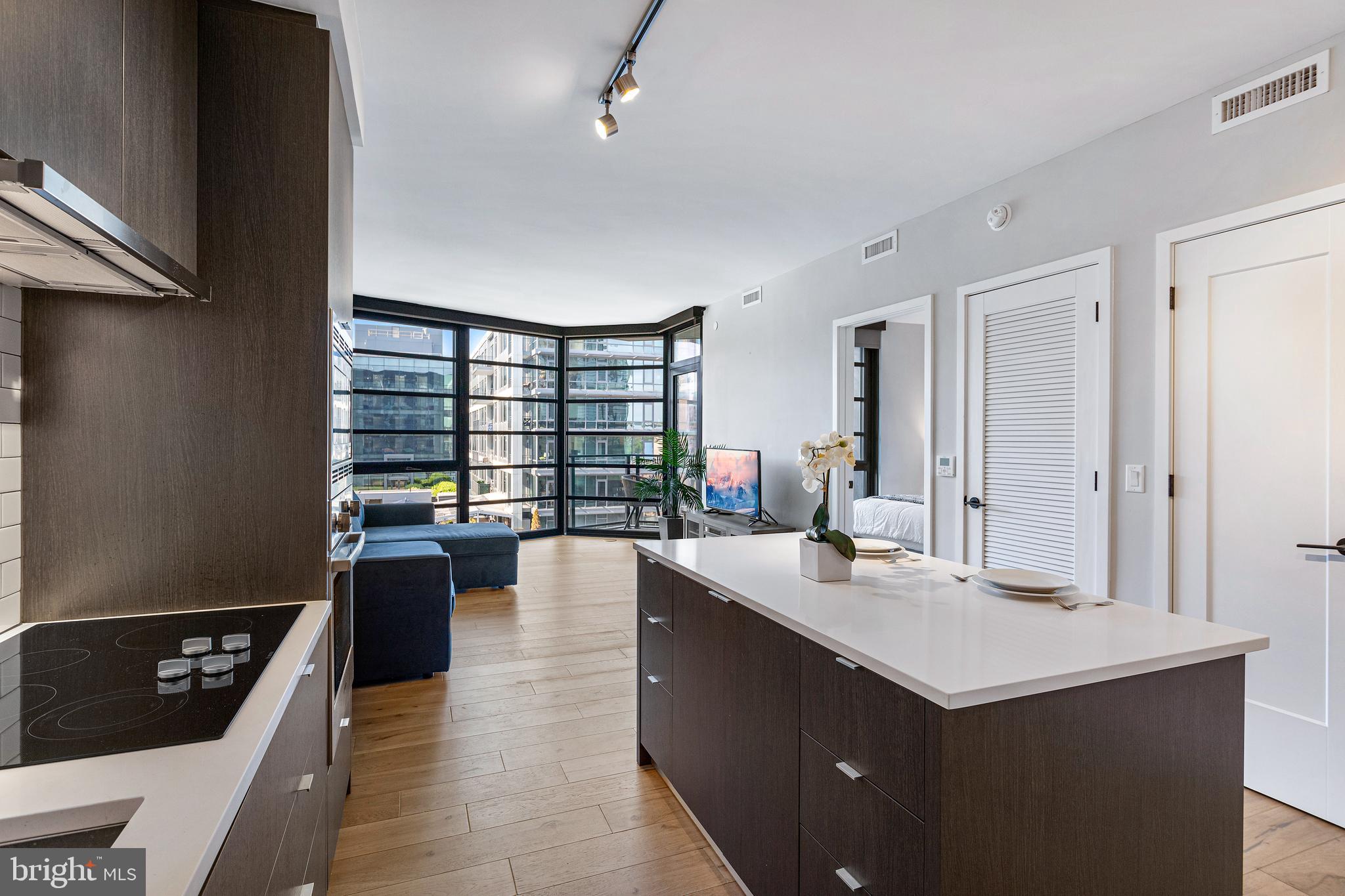 1300 4th Street Southeast, Unit 711 Washington, DC 20003 - Photo 11 of 28 a kitchen with counter top space and sink