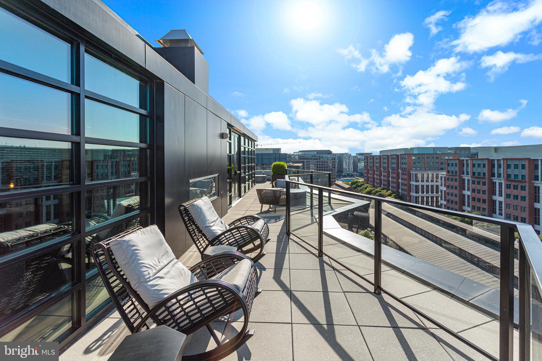 1300 4th Street Southeast, Unit 711 Washington, DC 20003 - Photo 20 of 29 a view of a balcony with chairs
