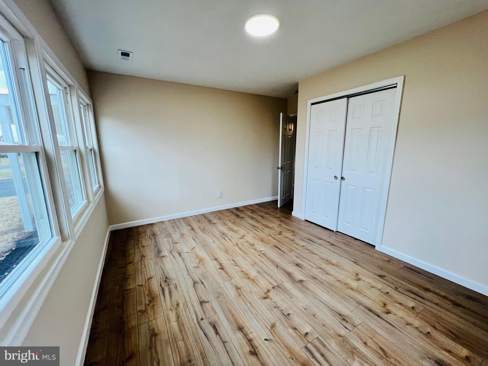 504 Selma Street Philadelphia, PA 19116 - Photo 16 of 31 a view of hallway with wooden floor