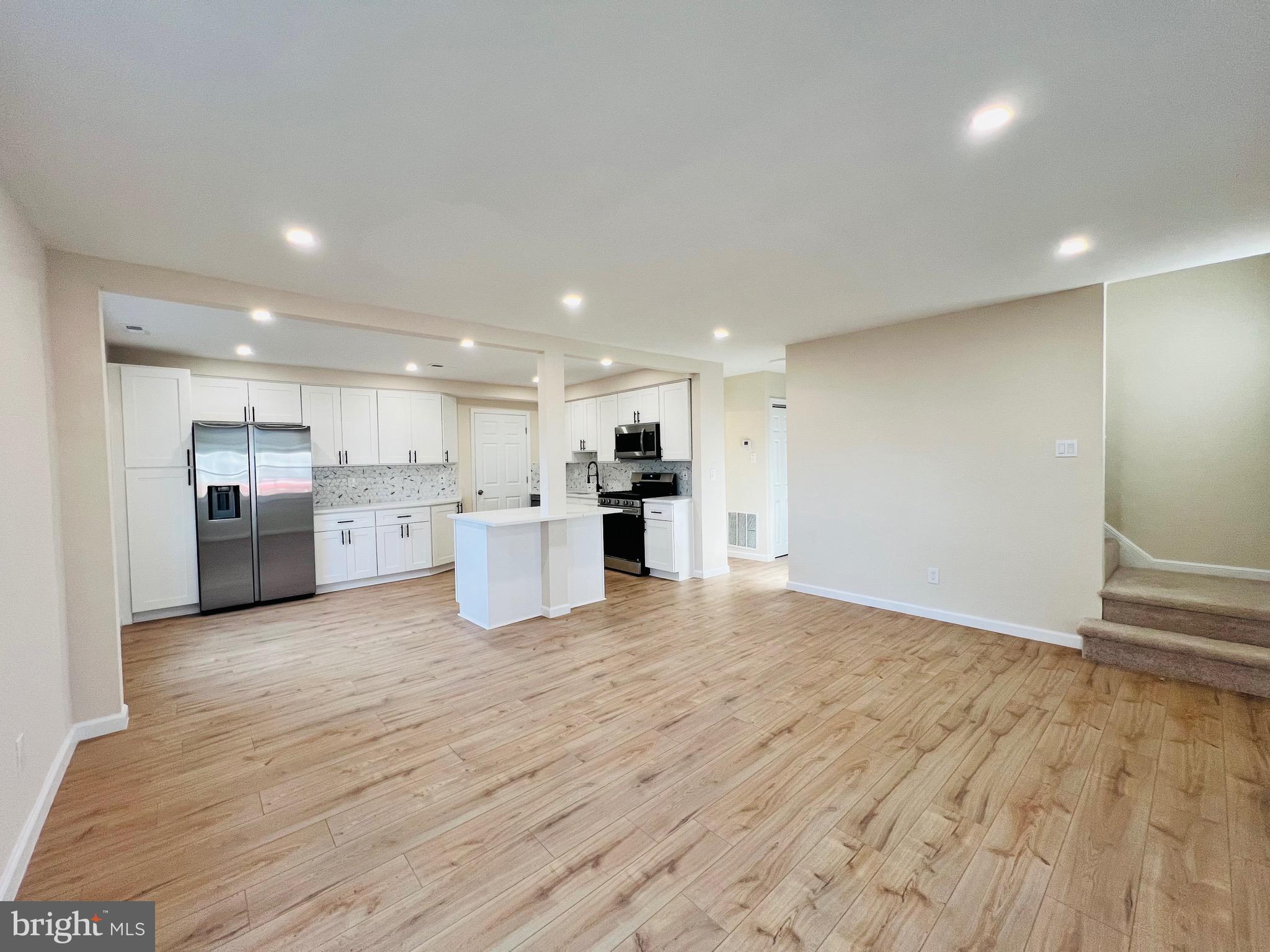 504 Selma Street Philadelphia, PA 19116 - Photo 9 of 31 a view of kitchen with kitchen island and stainless steel appliances