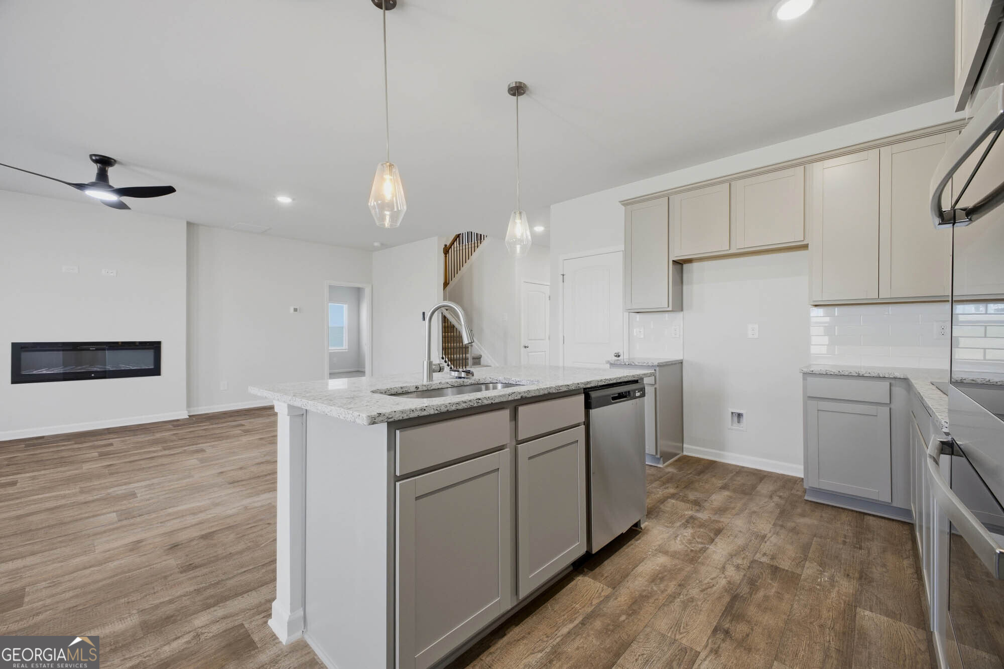 309 Rusty Plow Lane Perry, GA 31069 - Photo 21 of 34 a kitchen with a sink appliances and cabinets