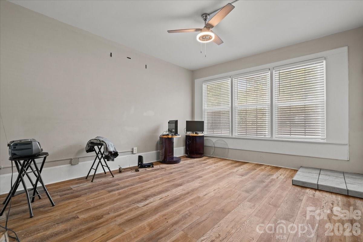 501 Church Street Cheraw, SC 29520 - Photo 8 of 48 a bedroom with furniture and a window