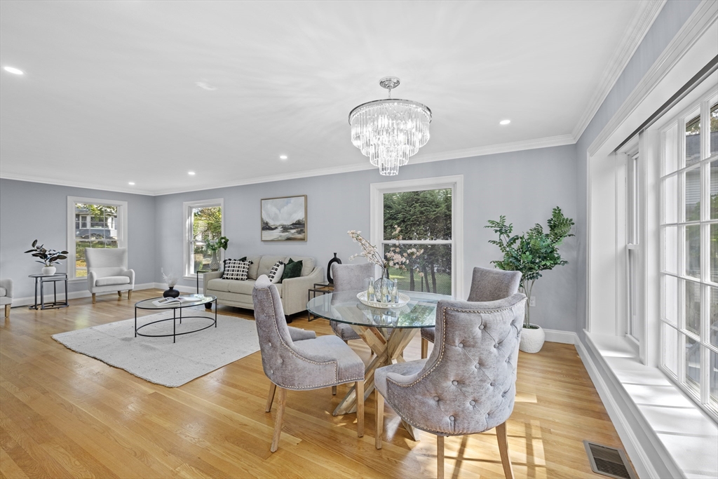 108 Radcliffe Road Belmont, MA 02478 - Photo 12 of 39 a view of a dining room with furniture wooden floor and chandelier