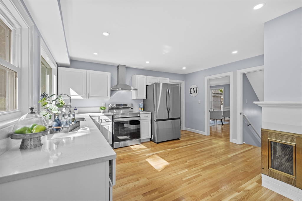 108 Radcliffe Road Belmont, MA 02478 - Photo 13 of 39 a kitchen with stainless steel appliances a refrigerator sink and stove