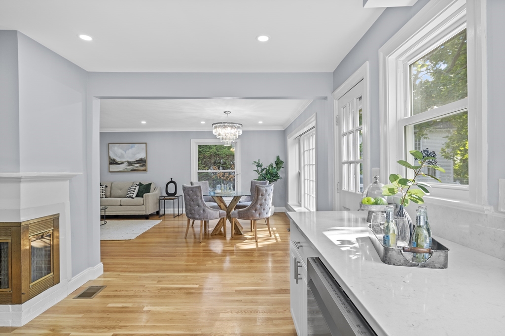108 Radcliffe Road Belmont, MA 02478 - Photo 15 of 39 a living room with fireplace furniture and a large window