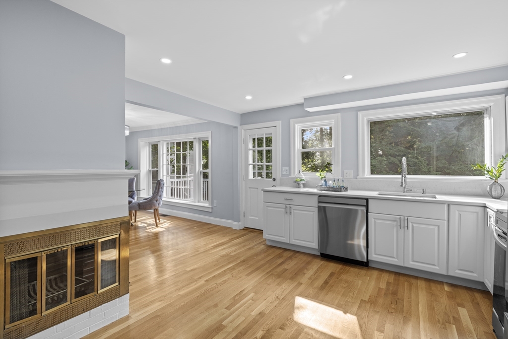 108 Radcliffe Road Belmont, MA 02478 - Photo 16 of 39 a kitchen with stainless steel appliances granite countertop a stove a sink and a refrigerator