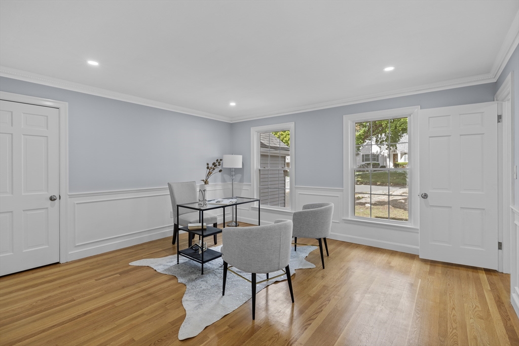 108 Radcliffe Road Belmont, MA 02478 - Photo 17 of 39 a view of a work space with furniture and wooden floor