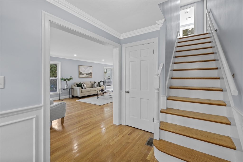 108 Radcliffe Road Belmont, MA 02478 - Photo 21 of 39 a view of a livingroom with furniture and stairs