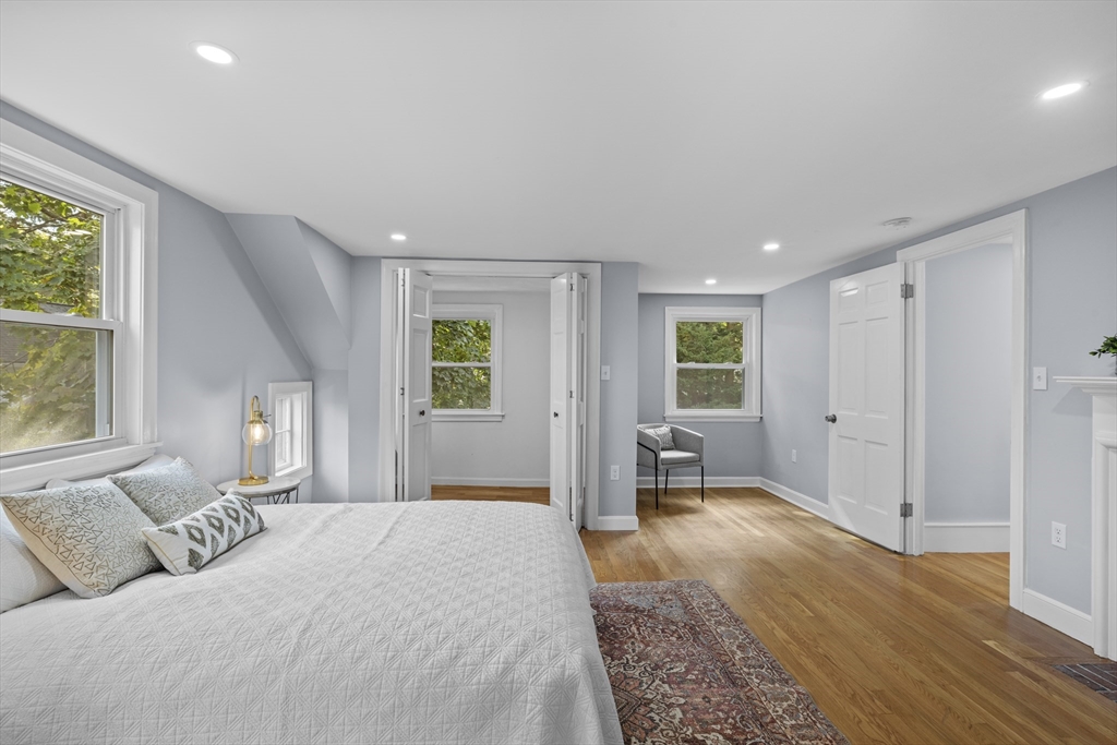 108 Radcliffe Road Belmont, MA 02478 - Photo 23 of 39 a spacious bedroom with a large bed and a window