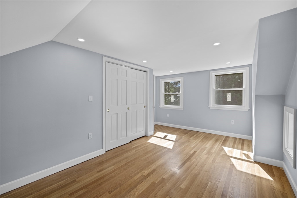 108 Radcliffe Road Belmont, MA 02478 - Photo 24 of 39 an empty room with wooden floor and windows