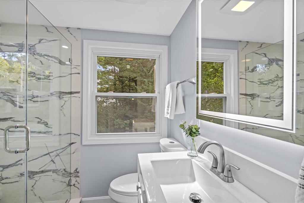 108 Radcliffe Road Belmont, MA 02478 - Photo 29 of 39 a bathroom with a sink toilet and shower