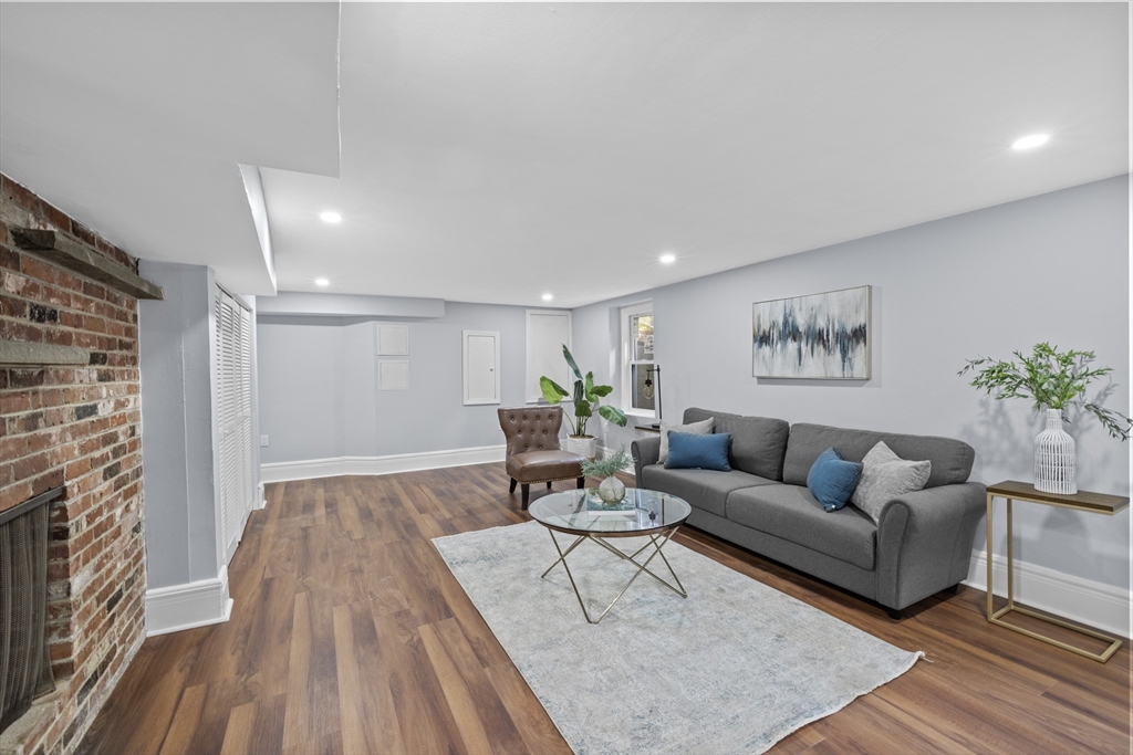 108 Radcliffe Road Belmont, MA 02478 - Photo 32 of 39 a living room with furniture and a wooden floor