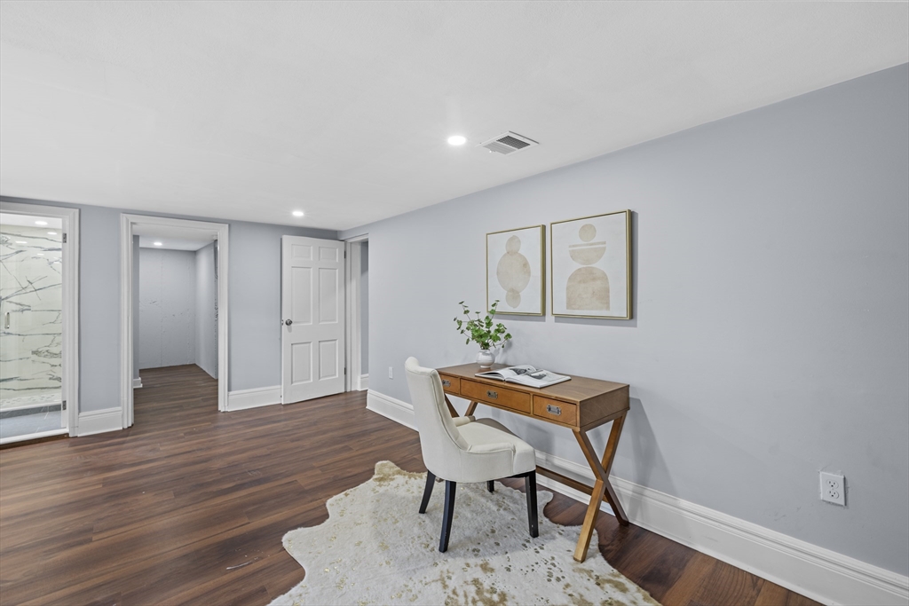 108 Radcliffe Road Belmont, MA 02478 - Photo 34 of 39 a workspace with furniture and wooden floor