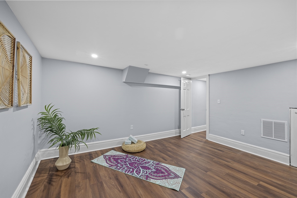 108 Radcliffe Road Belmont, MA 02478 - Photo 38 of 39 a view of an entryway with wooden floor