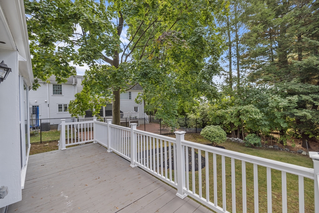108 Radcliffe Road Belmont, MA 02478 - Photo 5 of 39 a view of a yard with wooden fence