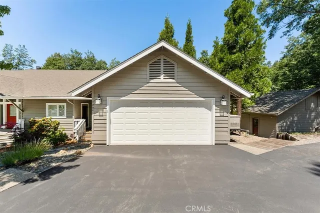 a view of a house with a garage