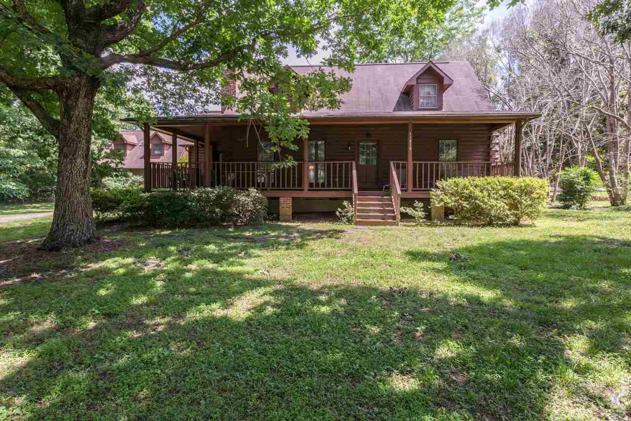 The expansive front porch is perfect for lazy days and rocking chairs! Wrap Around Front Porch