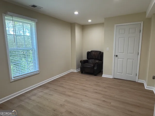 a view of livingroom with furniture and wooden floor