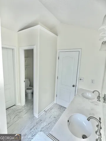 a bathroom with a sink and a tub