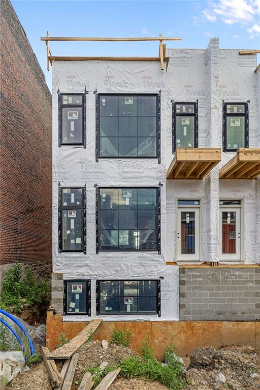 256 44th Street Pittsburgh, PA 15201 - Photo 2 of 45 a front view of a house with a yard