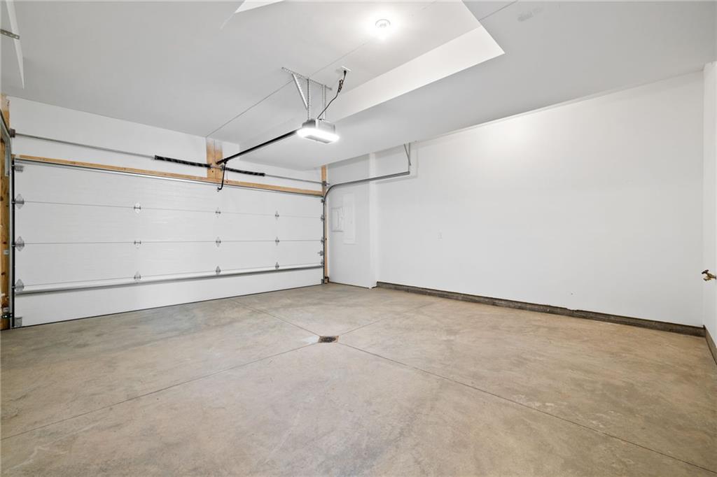 256 44th Street Pittsburgh, PA 15201 - Photo 40 of 45 an empty room with a ceiling fan and wooden floor