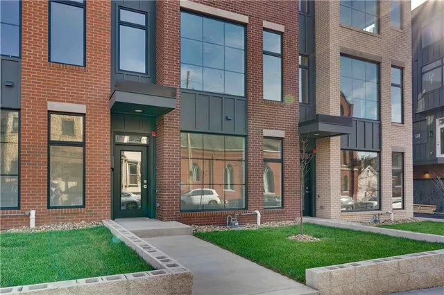 a view of city with tall buildings