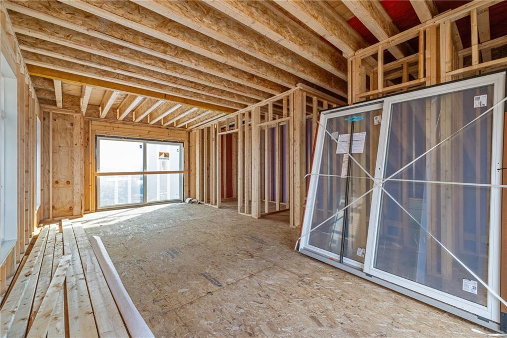 256 44th Street Pittsburgh, PA 15201 - Photo 7 of 45 a view of an empty room with wooden floor and a window