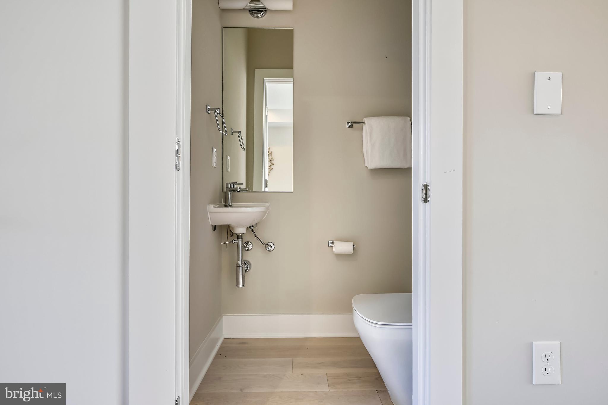 1824 Calvert Street Northwest, Unit 2 Washington, DC 20009 - Photo 16 of 39 Main Level Powder Room