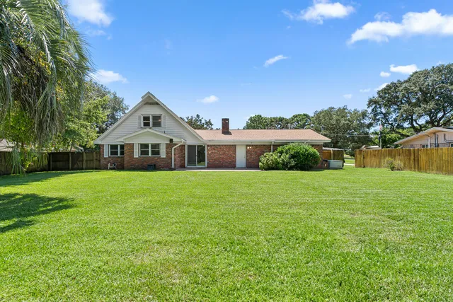 a view of a backyard with a garden