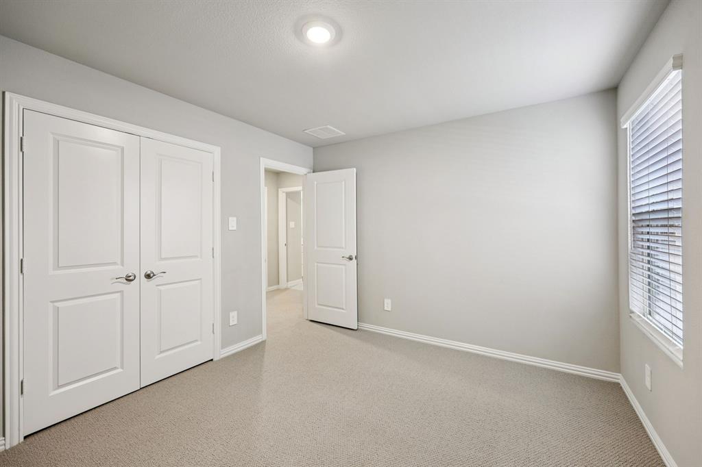 1721 Arches Road Anna, TX 75409 - Photo 36 of 39 a view of an empty room and window
