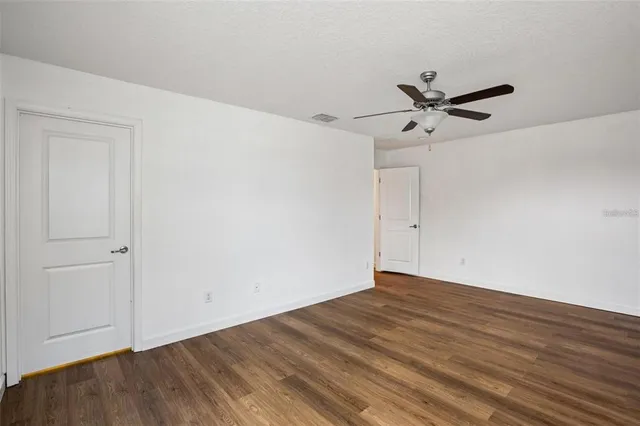 a view of a big room with wooden floor