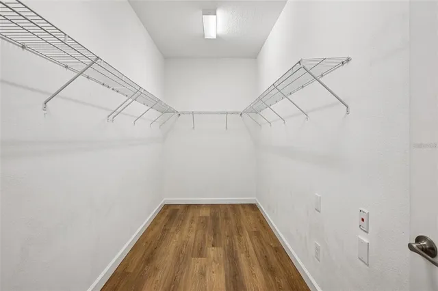 a view of a room with racks on the wall