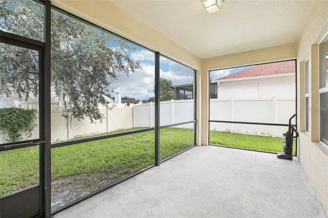 a view of outdoor space and backyard