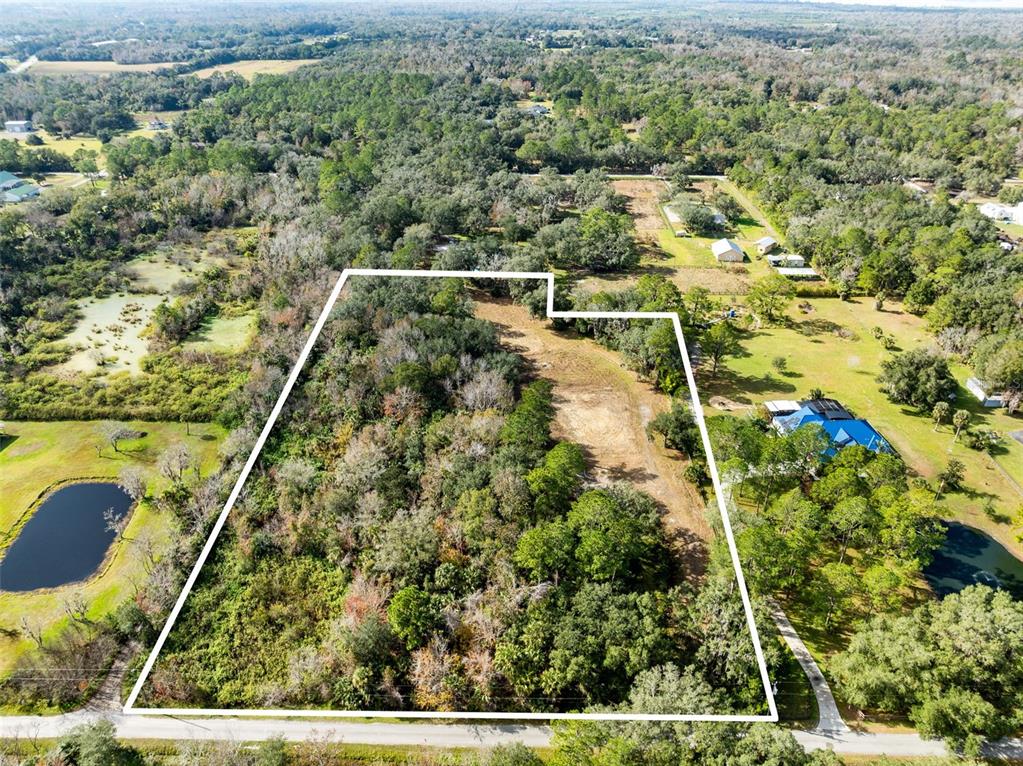1630 Murphy Street Oviedo, FL 32765 - Photo 3 of 17 an aerial view of residential houses with outdoor space