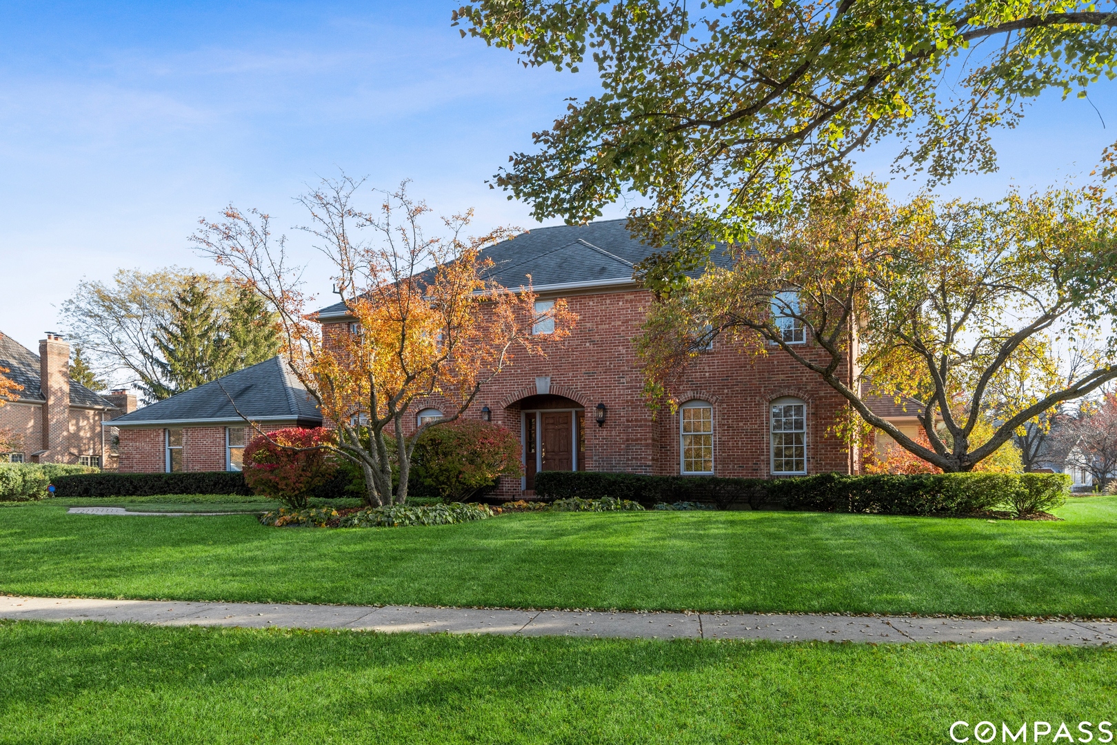 235 South Poplar Road Lake Forest, IL 60045 - Photo 1 of 1 a view of a house with a big yard and large trees