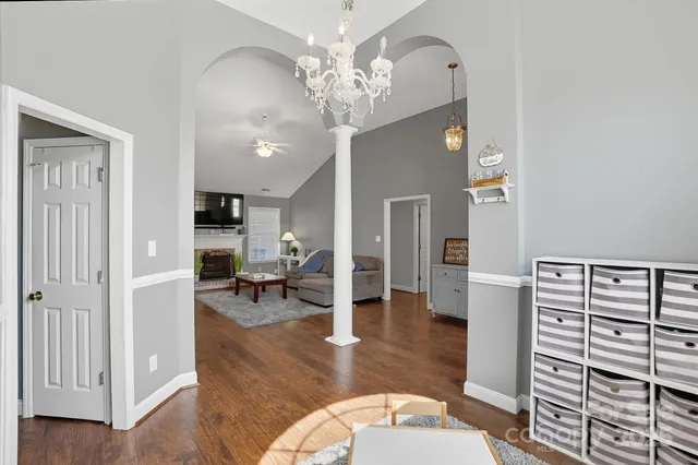 a view of a livingroom with furniture and wooden floor