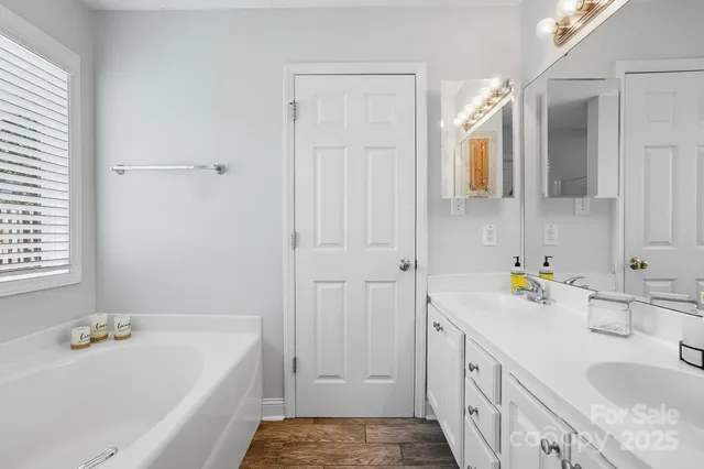 a bathroom with a sink and a bathtub