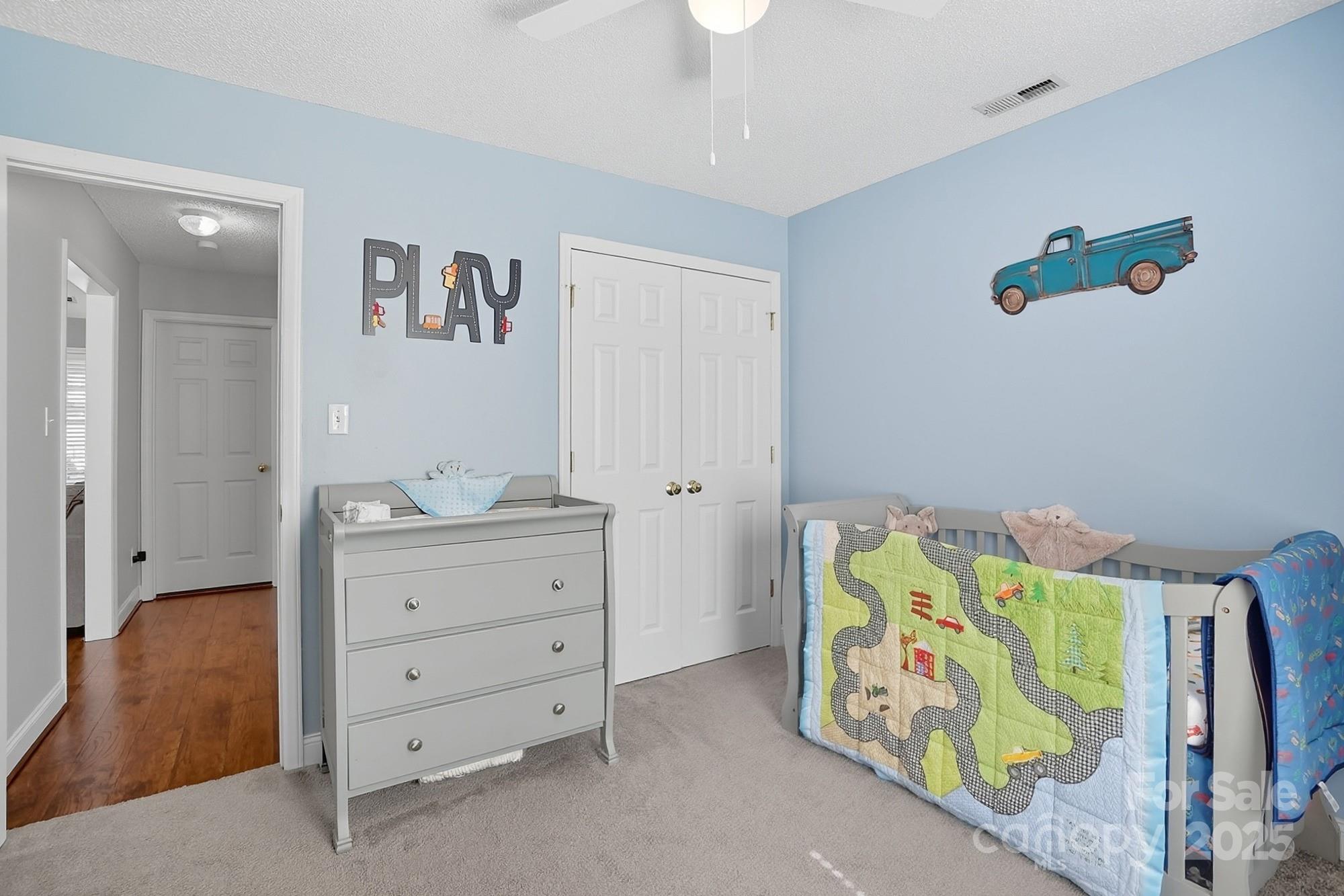 12639 Hill Pine Road Midland, NC 28107 - Photo 33 of 45 a bedroom with a bed and a dresser