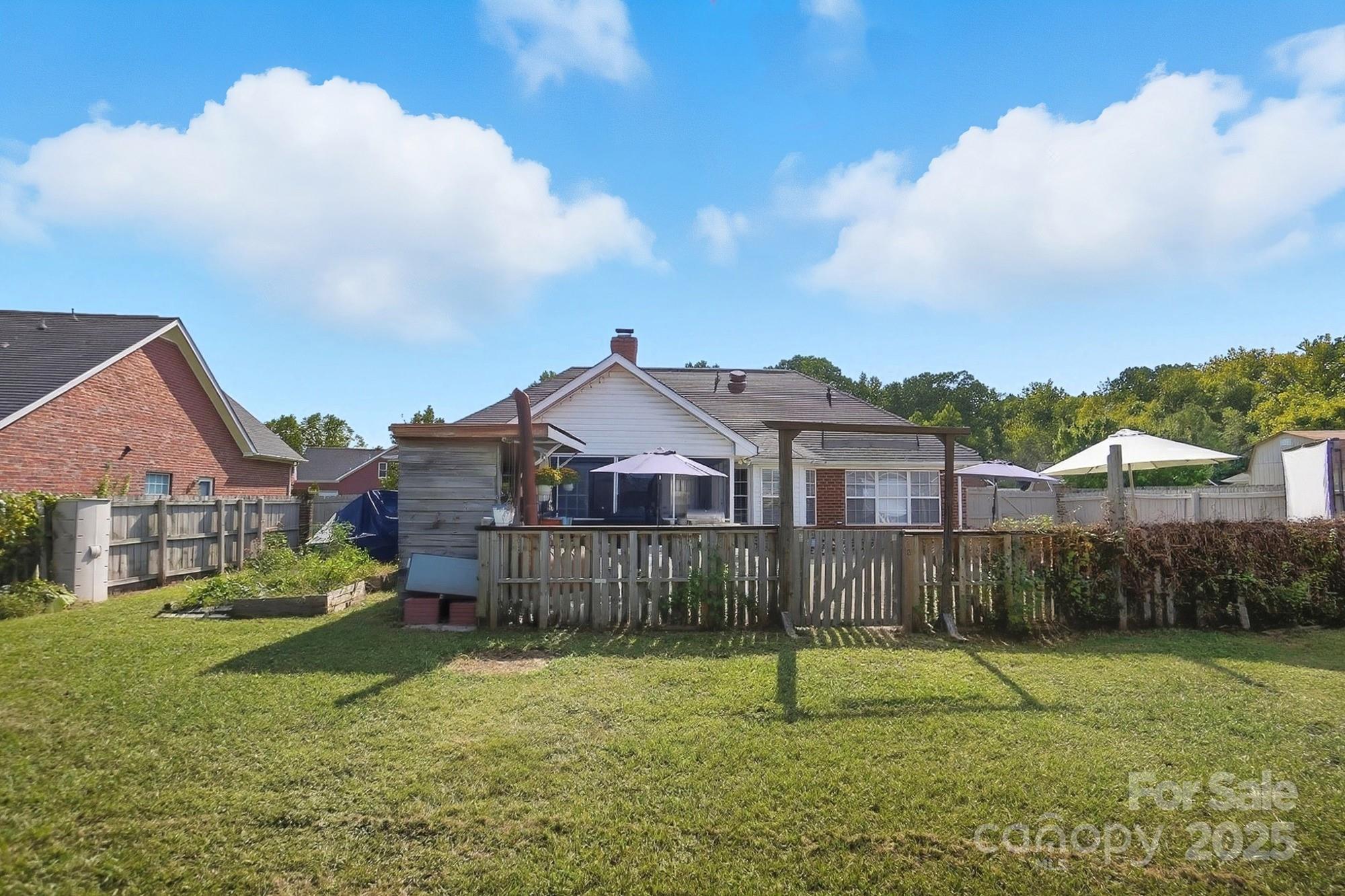 12639 Hill Pine Road Midland, NC 28107 - Photo 45 of 45 a view of a yard in front of a house with a yard