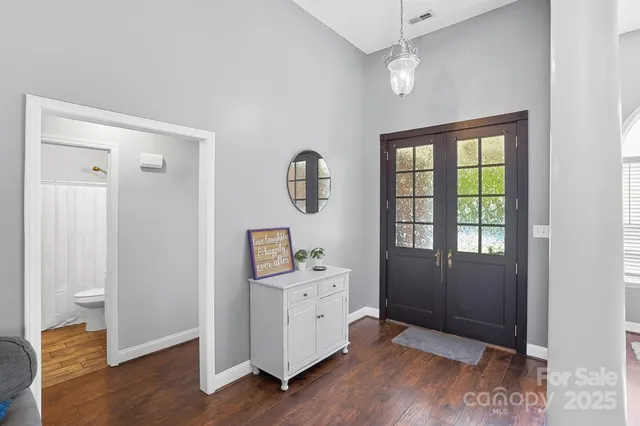 a view of entryway with wooden floor