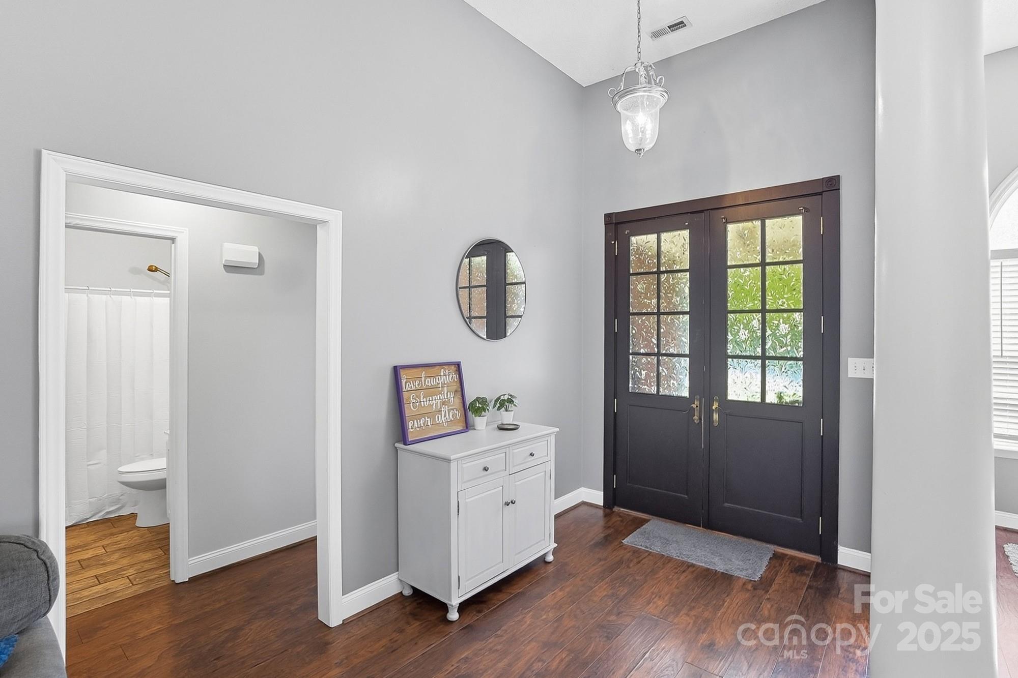 12639 Hill Pine Road Midland, NC 28107 - Photo 5 of 45 a view of entryway with wooden floor