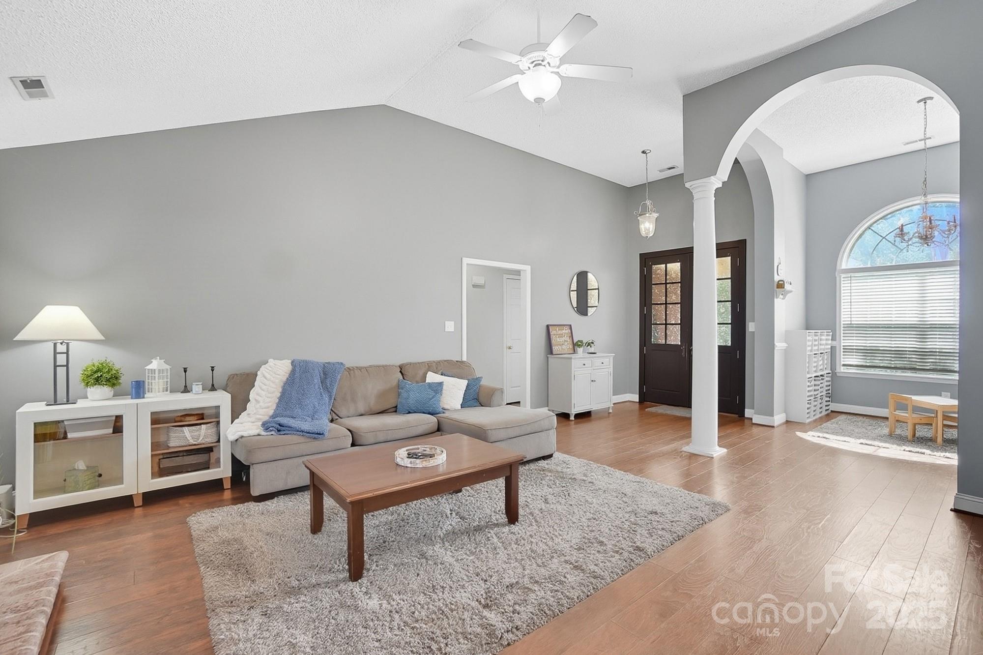 12639 Hill Pine Road Midland, NC 28107 - Photo 9 of 45 a living room with furniture and wooden floor