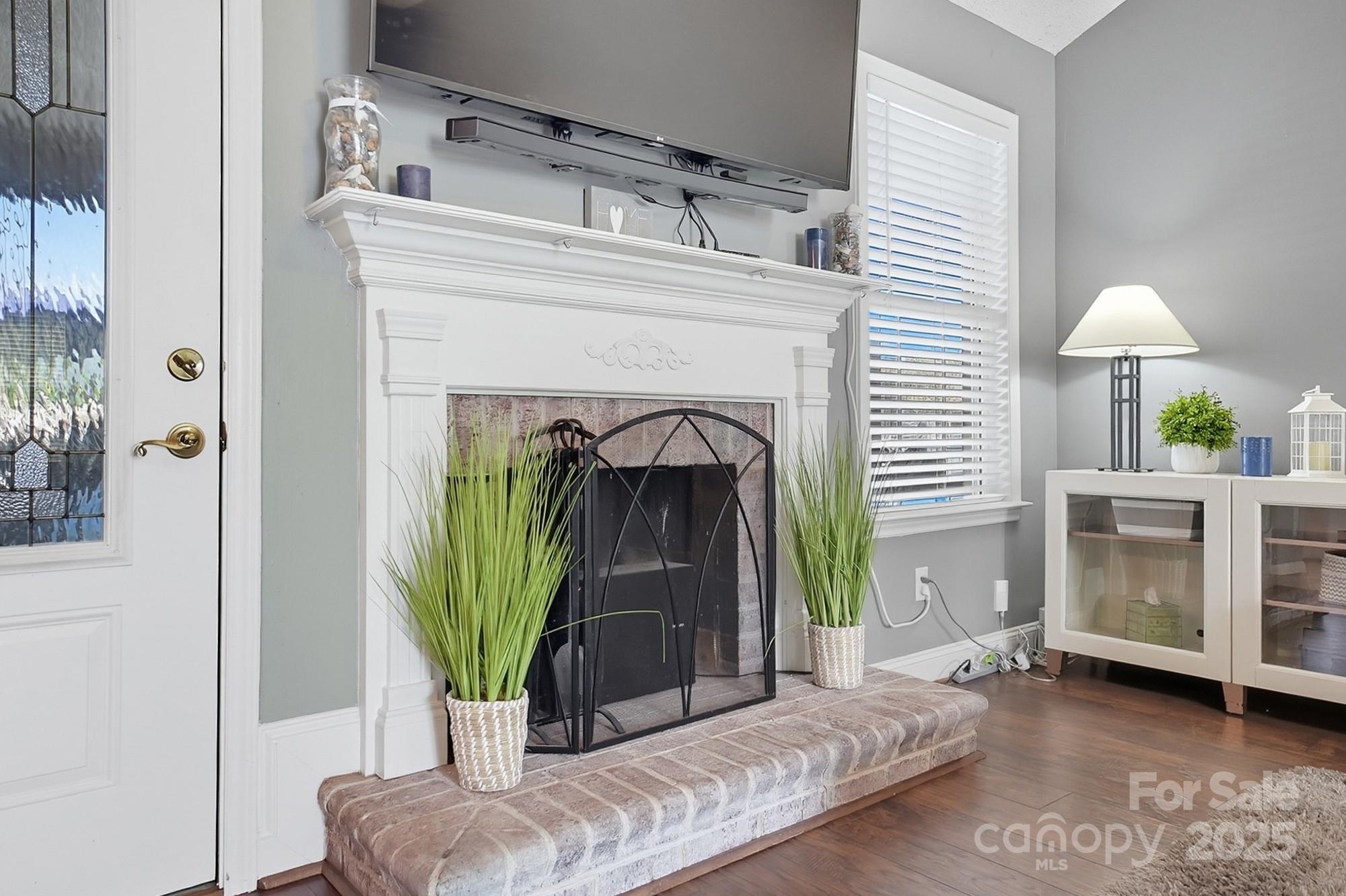 12639 Hill Pine Road Midland, NC 28107 - Photo 10 of 45 a living room with furniture and a fireplace