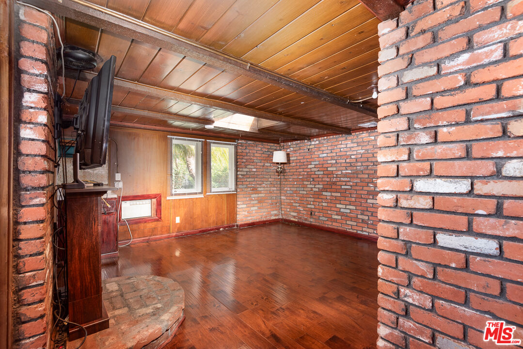 14842 Morrison Street Sherman Oaks, CA 91403 - Photo 12 of 41 a view of an empty room with a window