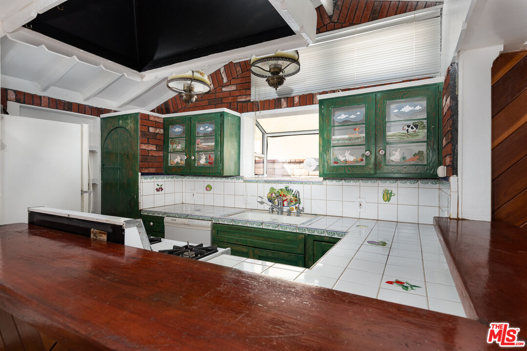 14842 Morrison Street Sherman Oaks, CA 91403 - Photo 16 of 41 a living room with furniture and a flat screen tv