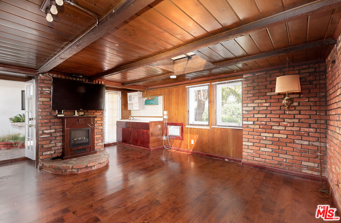 14842 Morrison Street Sherman Oaks, CA 91403 - Photo 23 of 41 a view of livingroom with furniture and a flat screen tv