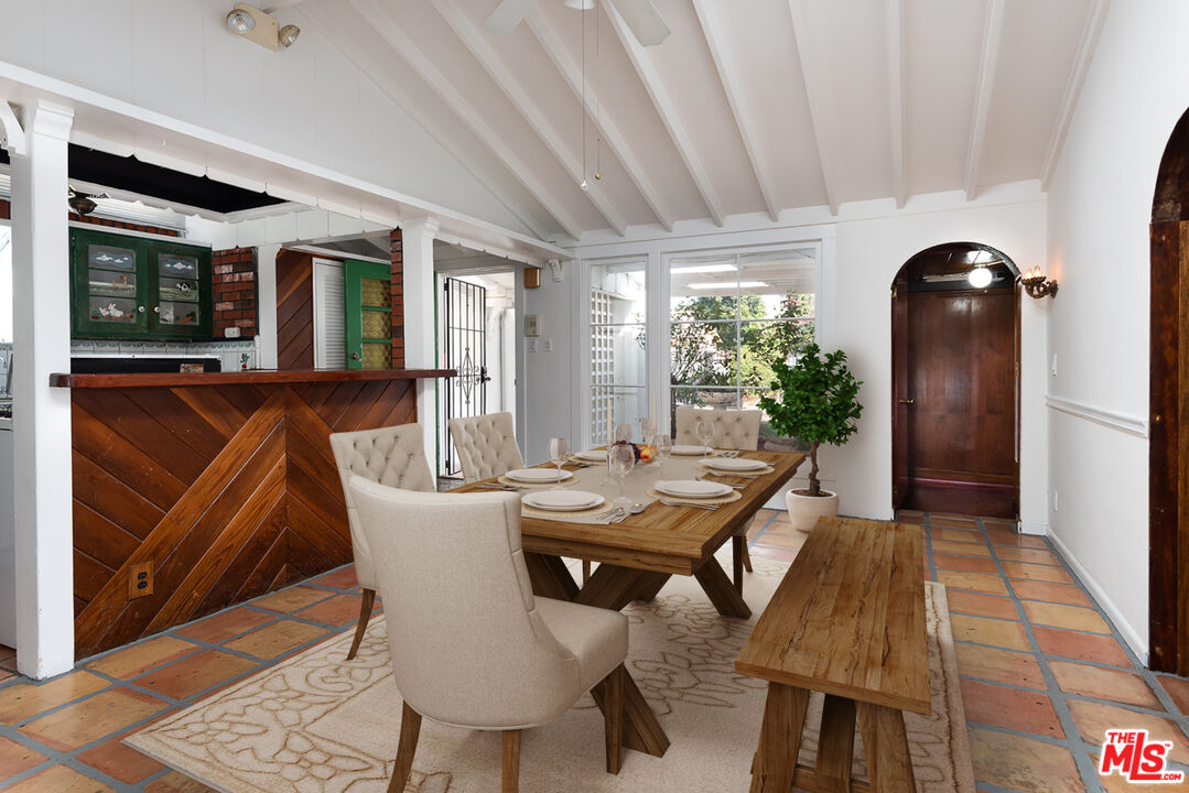 14842 Morrison Street Sherman Oaks, CA 91403 - Photo 6 of 41 a dining room with furniture and window